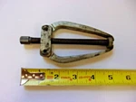 * Kent-moore J-28509-A Jaw Gear Puller. Fixed Price $69.00.